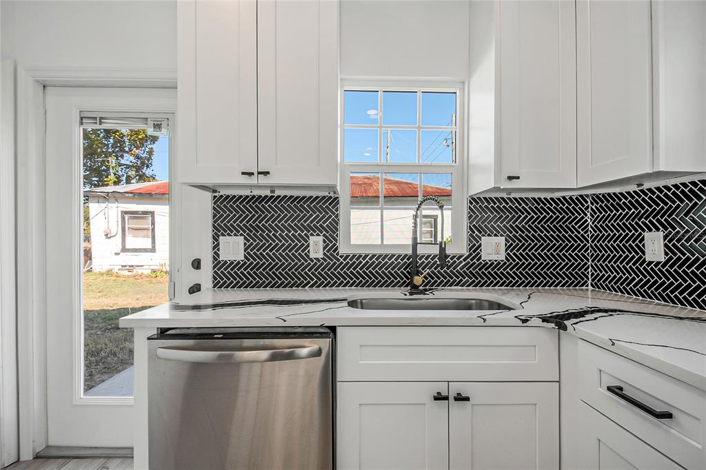 38835 Pine Street Umatilla, FL 32784 - Photo 27 of 36 a kitchen with a sink and a window