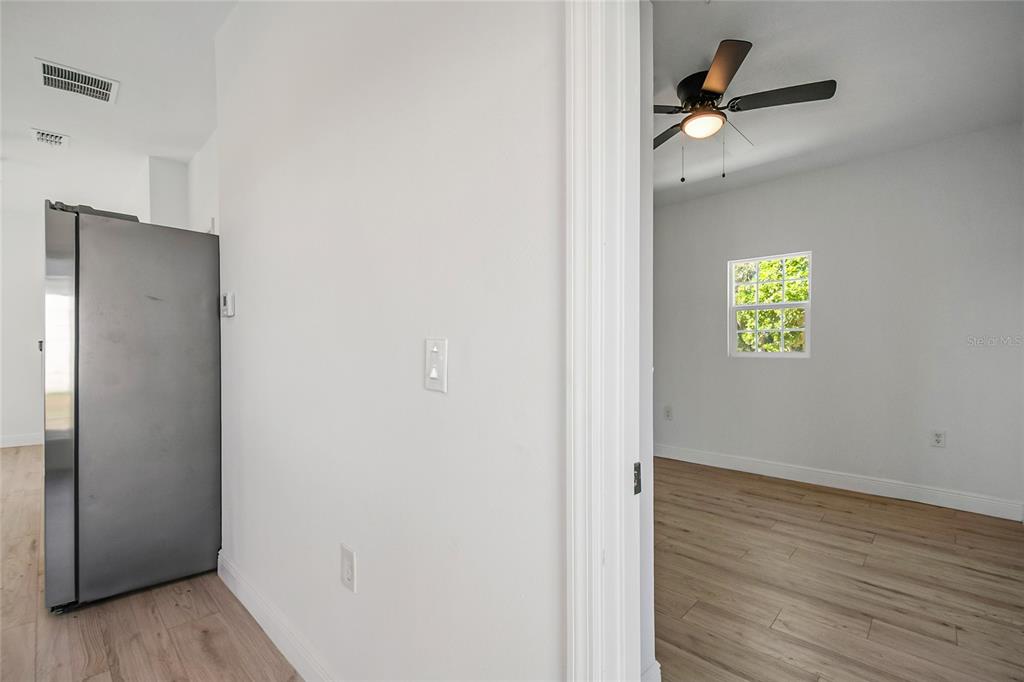 38835 Pine Street Umatilla, FL 32784 - Photo 28 of 36 a view of an entryway with wooden floor