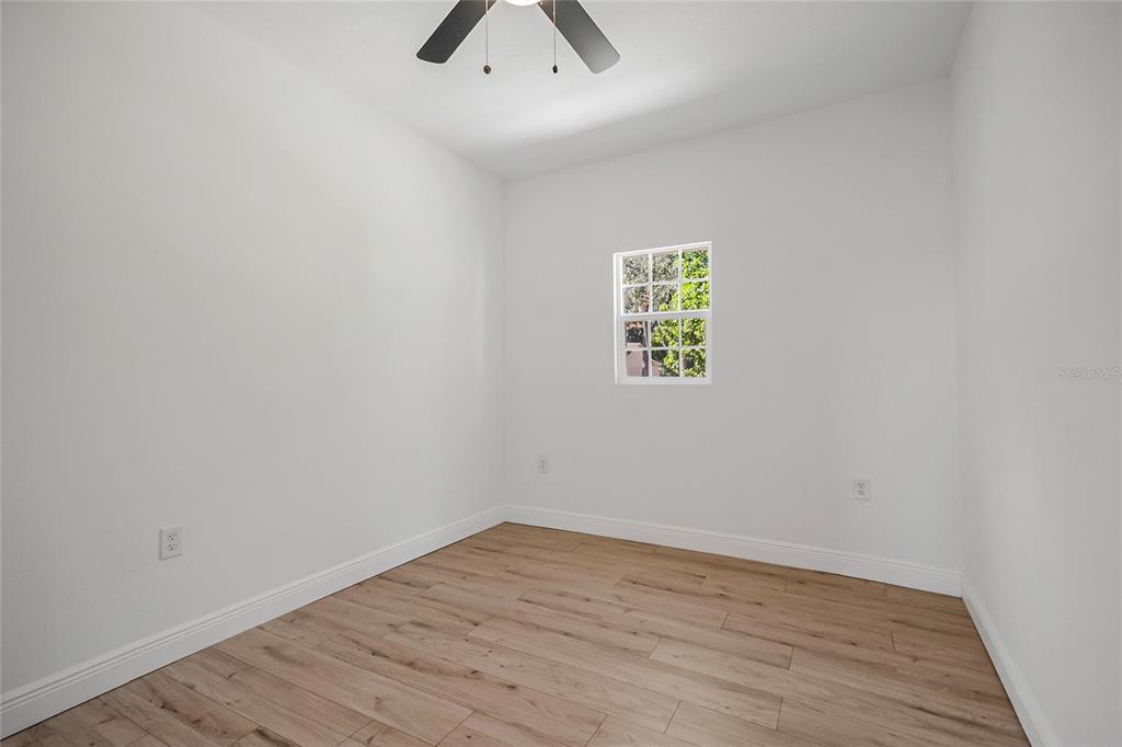 38835 Pine Street Umatilla, FL 32784 - Photo 29 of 36 an empty room with a window