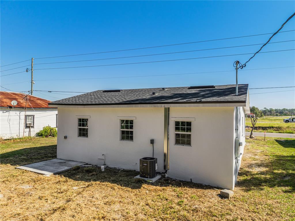38835 Pine Street Umatilla, FL 32784 - Photo 32 of 36 a view of a house with backyard