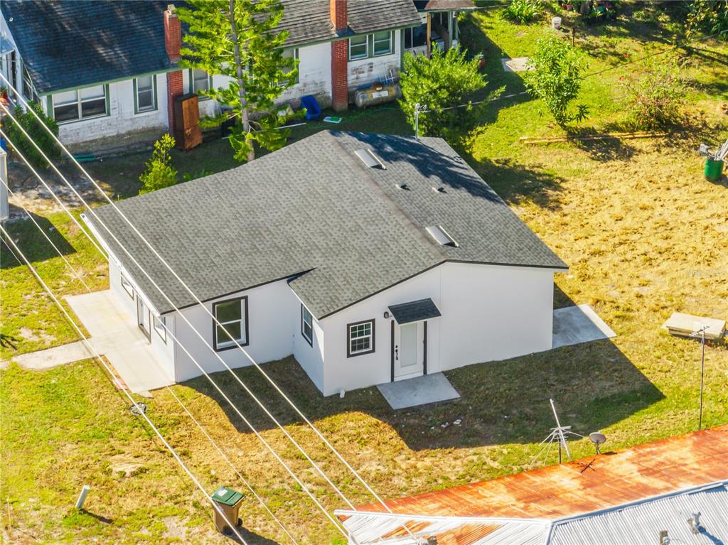 38835 Pine Street Umatilla, FL 32784 - Photo 33 of 36 a aerial view of a house with a yard