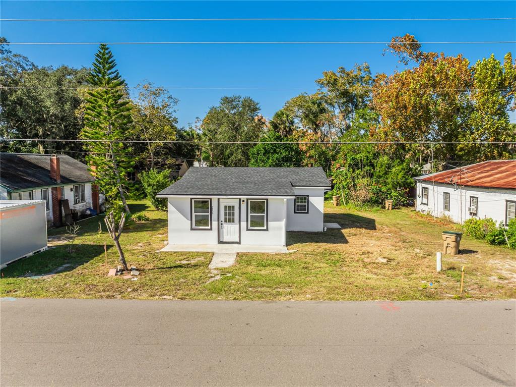 38835 Pine Street Umatilla, FL 32784 - Photo 4 of 36 front view of a house with a street