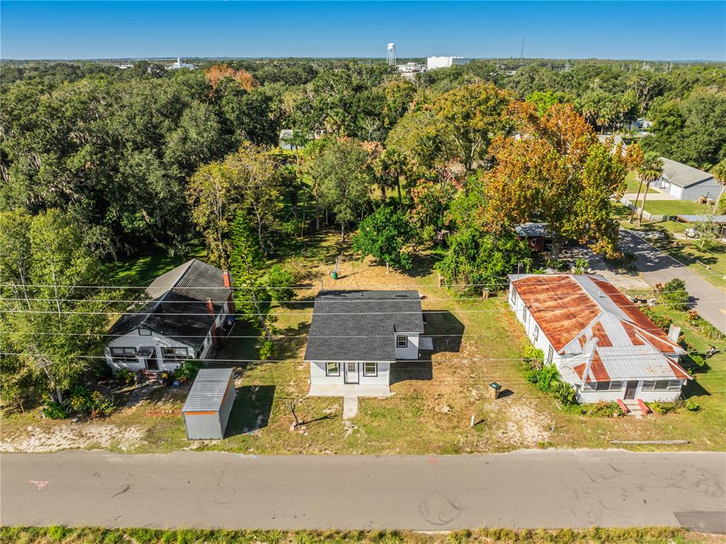 38835 Pine Street Umatilla, FL 32784 - Photo 5 of 36 aerial view of a house with a yard