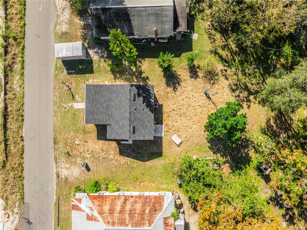 38835 Pine Street Umatilla, FL 32784 - Photo 6 of 36 an aerial view of residential house with outdoor space