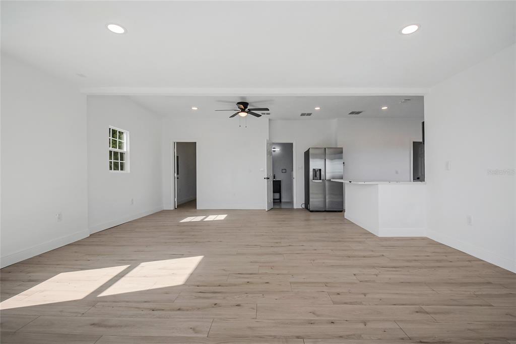 38835 Pine Street Umatilla, FL 32784 - Photo 10 of 36 a view of a livingroom with a staircase