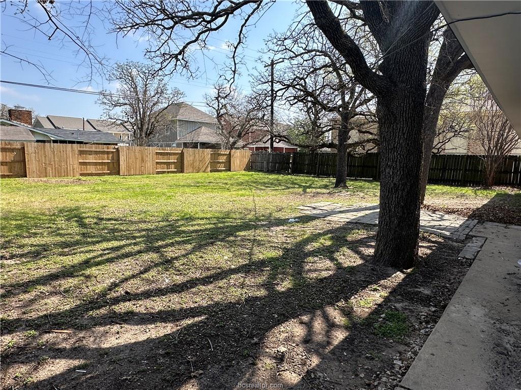 4005 College Main Street Bryan, TX 77801 - Photo 5 of 18 a view of a house with a yard