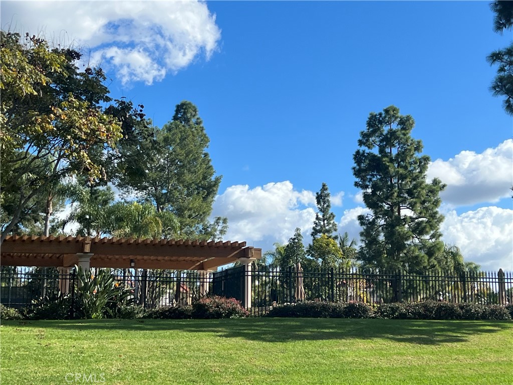 107 Gallery Tustin, CA 92782 - Photo 13 of 15 a front view of a house with a big yard
