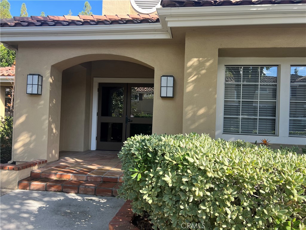 107 Gallery Tustin, CA 92782 - Photo 4 of 15 a front view of a house