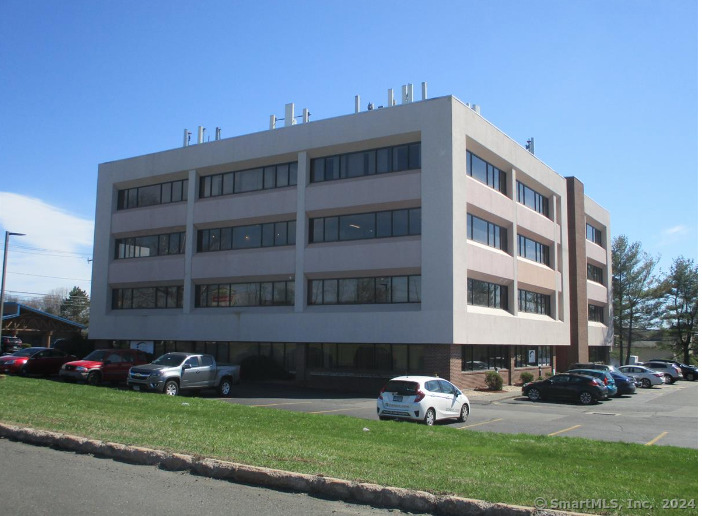 546 South Broad Street Meriden, CT 06450 - Photo 1 of 1 a front view of a building with yard