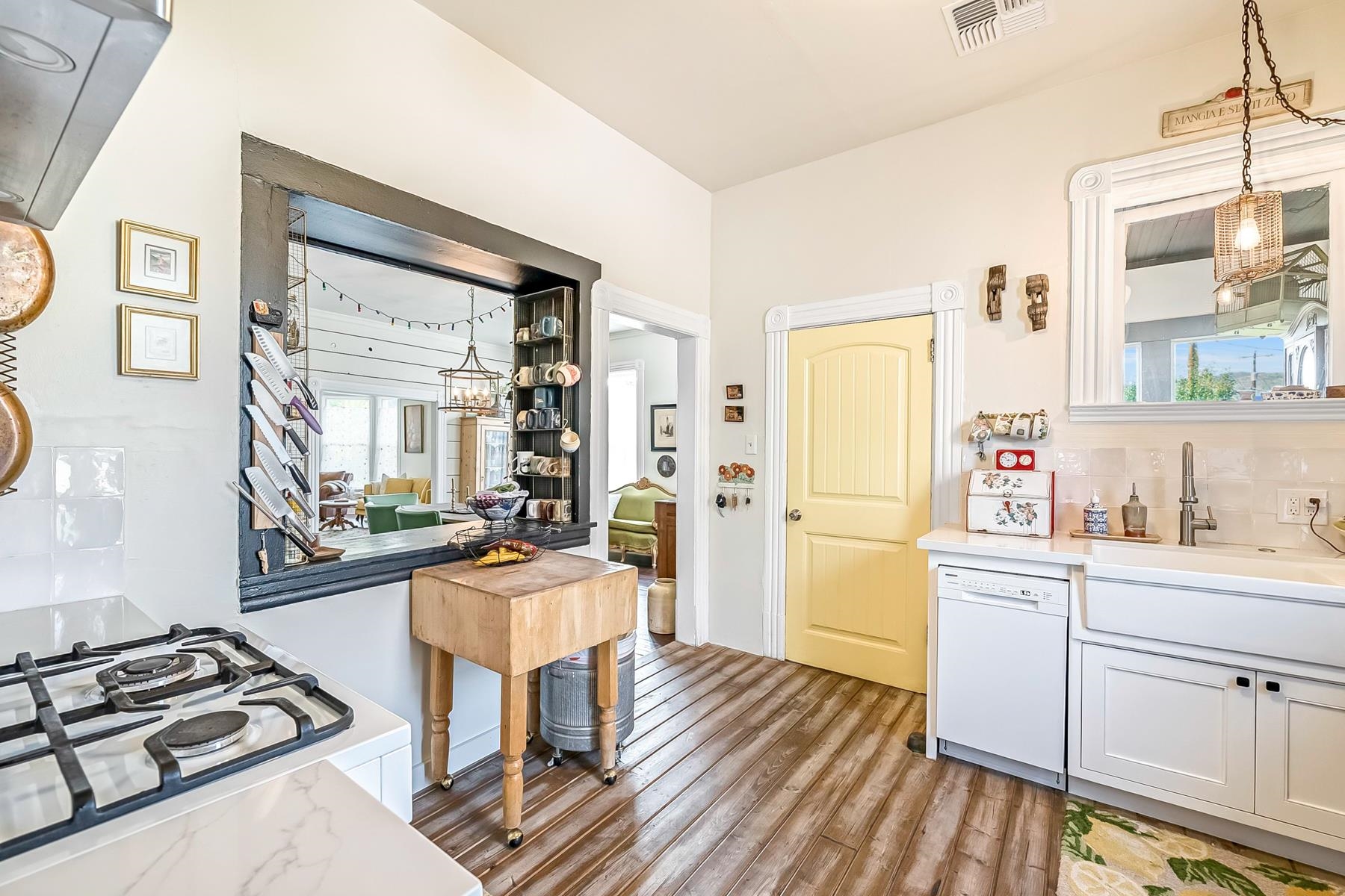 201 Front Street Loyalton, CA 96118 - Photo 12 of 28 a kitchen with a sink stove and wooden floor
