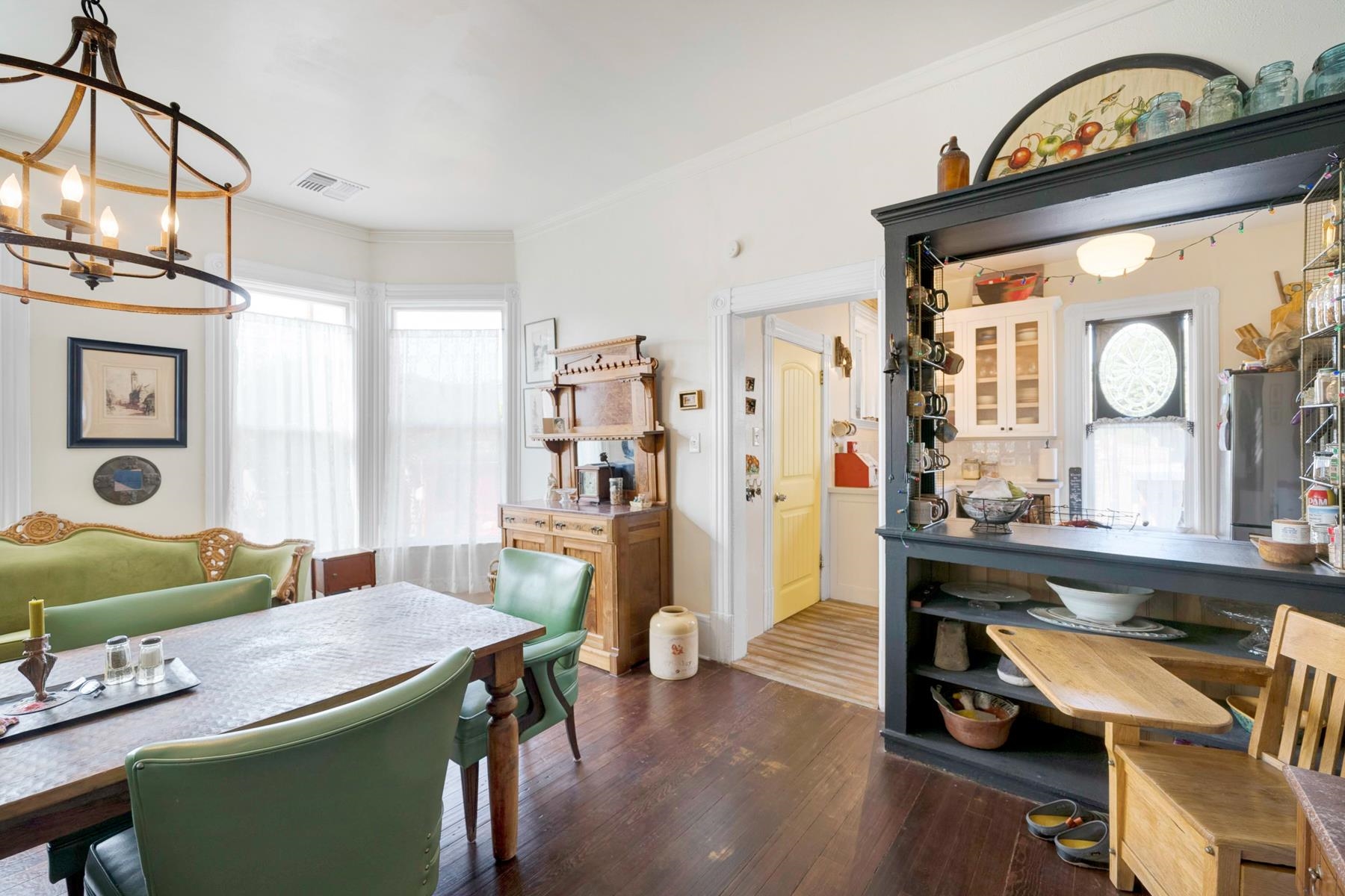 201 Front Street Loyalton, CA 96118 - Photo 14 of 28 a view of a dining room with furniture and a chandelier