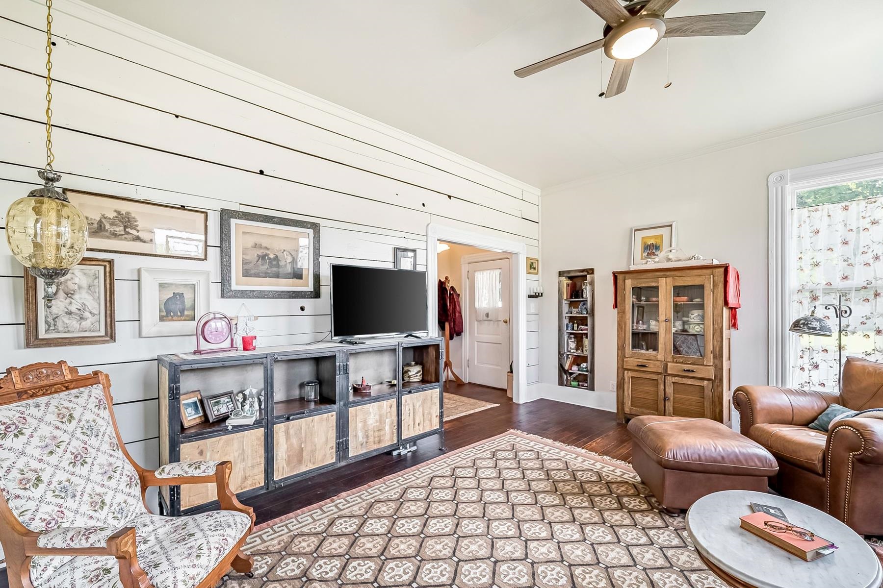 201 Front Street Loyalton, CA 96118 - Photo 16 of 28 a living room with furniture and a flat screen tv