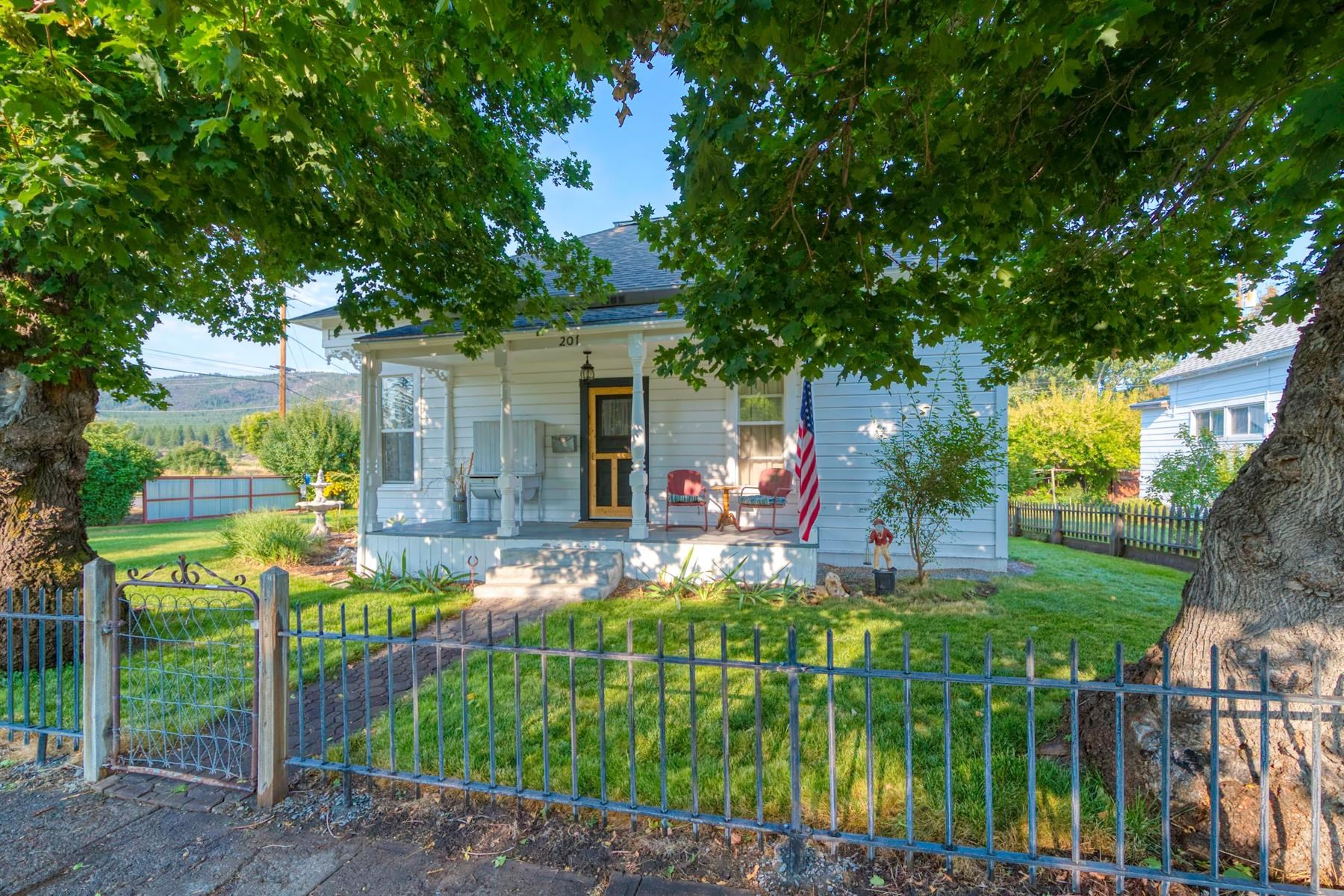 201 Front Street Loyalton, CA 96118 - Photo 2 of 28 a front view of house with yard and outdoor seating