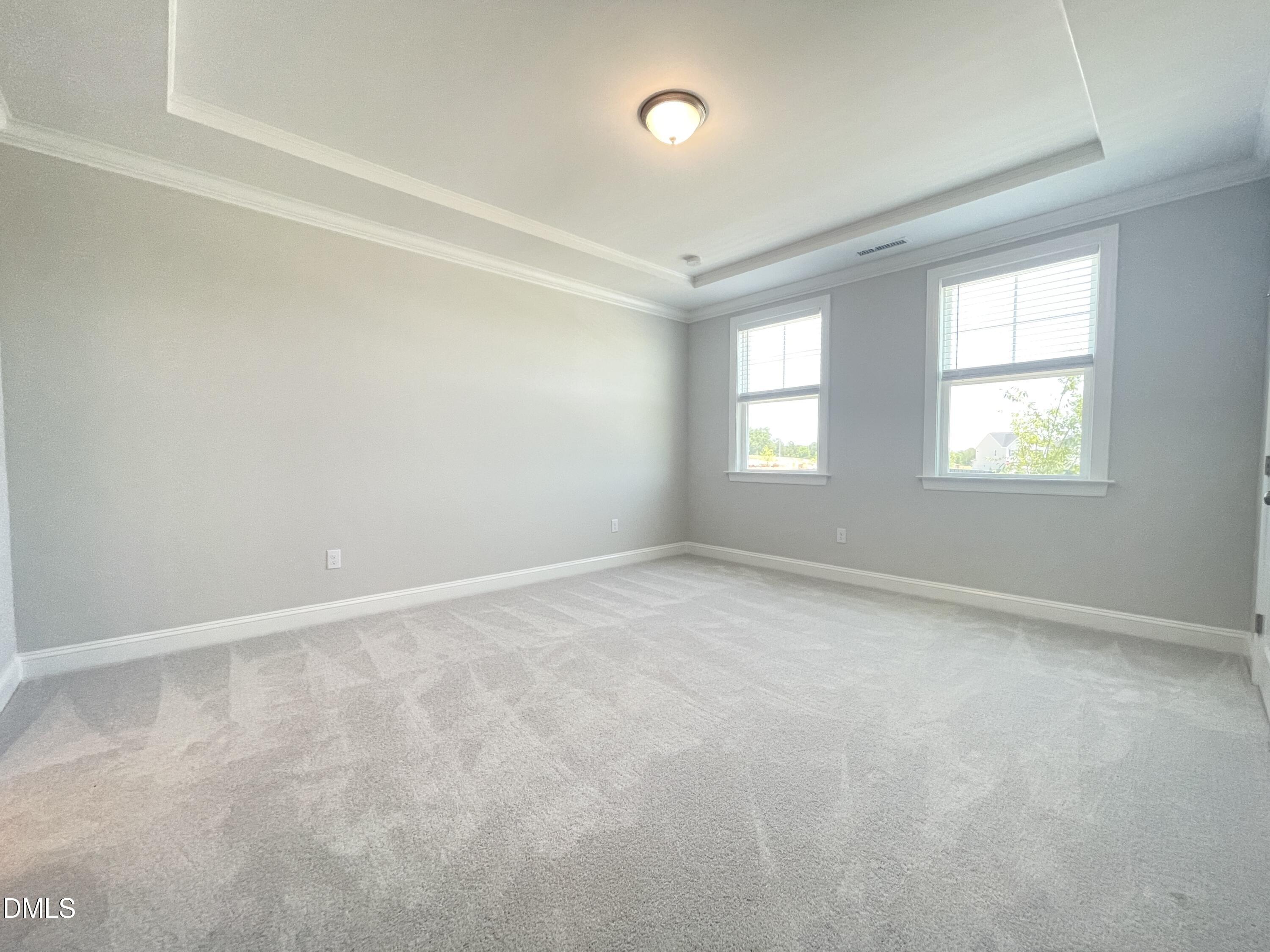 152 Baymouth Lane Raleigh, NC 27610 - Photo 15 of 34 an empty room with windows