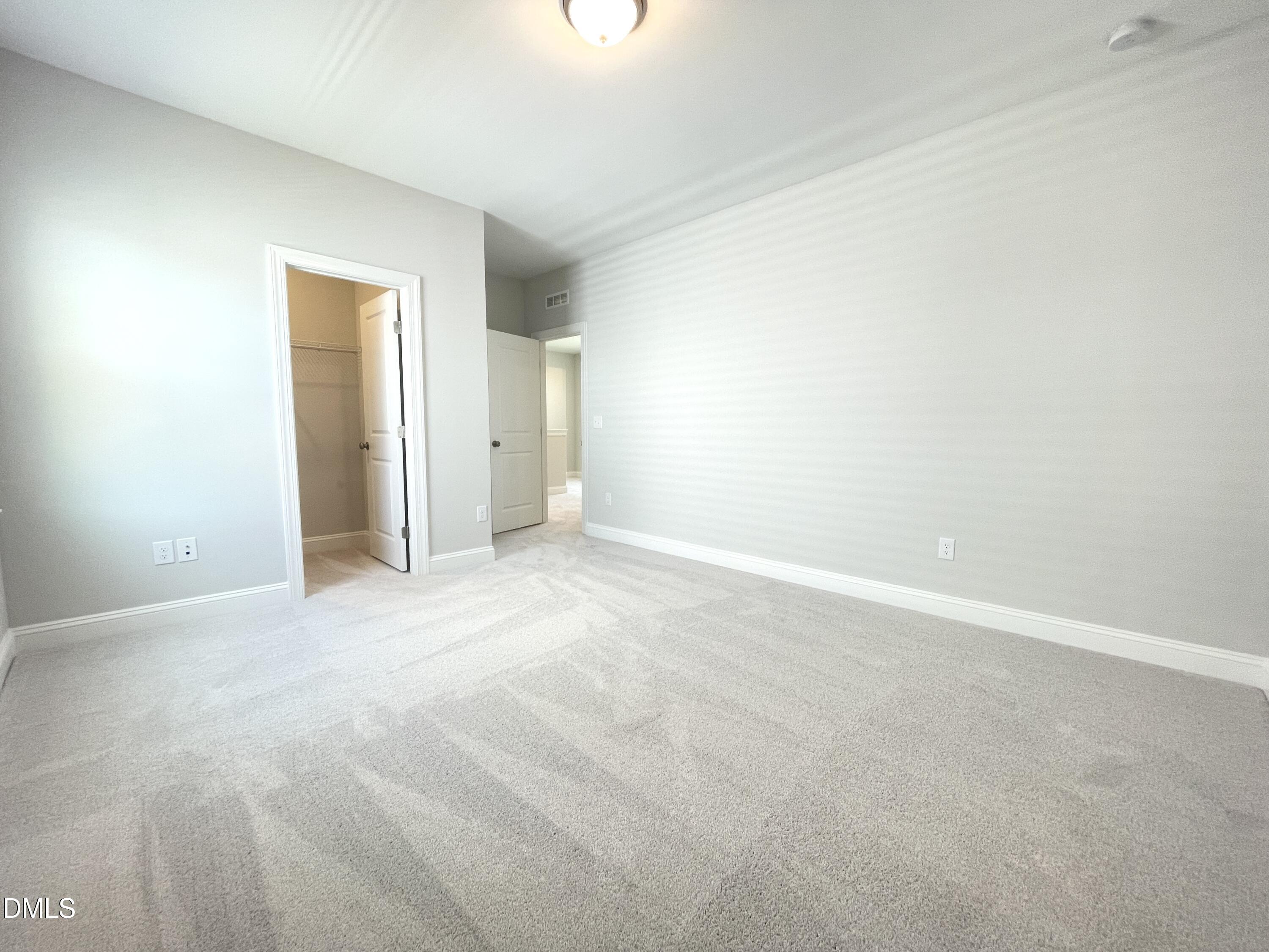 152 Baymouth Lane Raleigh, NC 27610 - Photo 25 of 34 a view of an empty room with a window