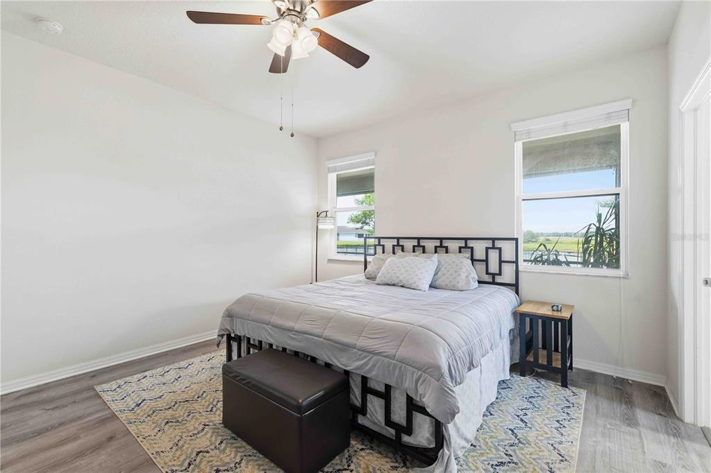 10920 79th Street East Parrish, FL 34219 - Photo 35 of 73 a bedroom with a bed and a window