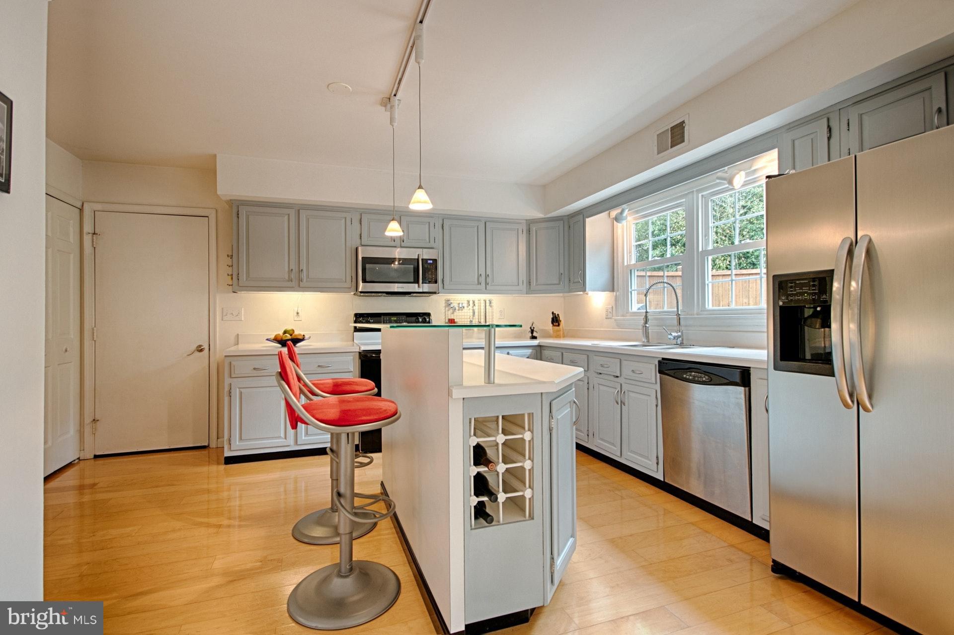 3217 Fox Mill Road Oakton, VA 22124 - Photo 14 of 30 Bright kitchen with center island