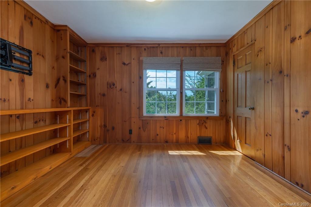 300 Doubleday Road Tryon, NC 28782 - Photo 19 of 38 a view of walk in closet with empty racks
