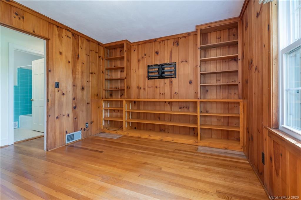 300 Doubleday Road Tryon, NC 28782 - Photo 20 of 38 a view of an empty room with wooden floor and a window