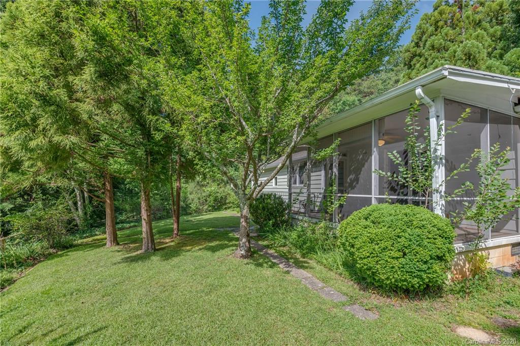 300 Doubleday Road Tryon, NC 28782 - Photo 35 of 38 front view of a house with a yard