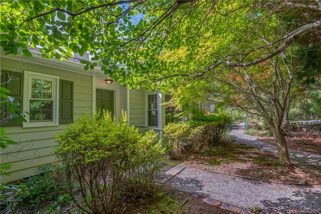 300 Doubleday Road Tryon, NC 28782 - Photo 6 of 38 a view of a house with a tree