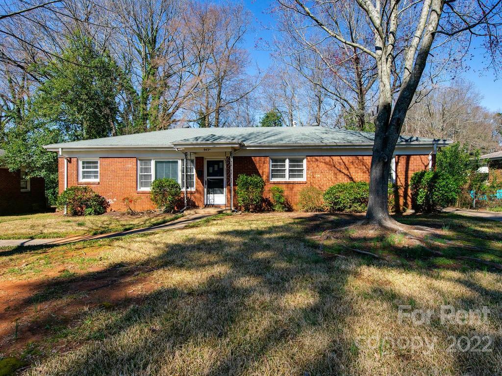 943 B Norland Road, Unit B Charlotte, NC 28205 - Photo 1 of 17 a view of a house with backyard and a tree