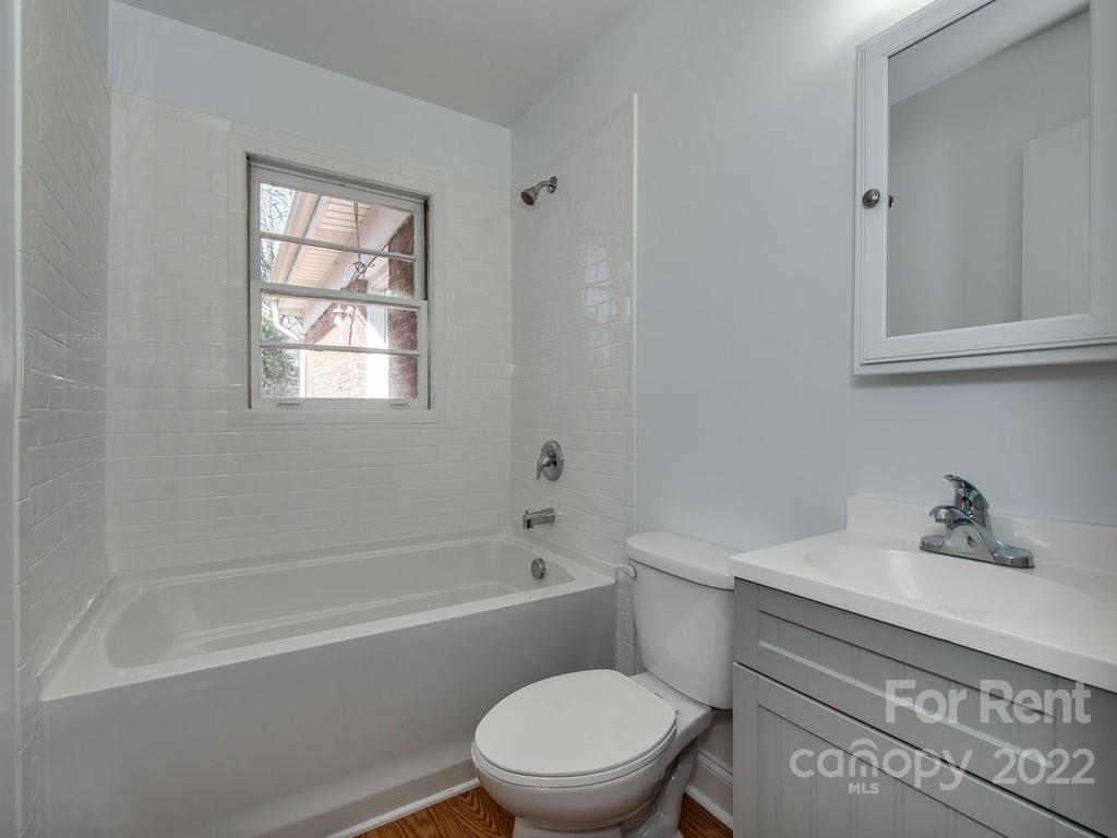 943 B Norland Road, Unit B Charlotte, NC 28205 - Photo 14 of 17 a bathroom with a sink toilet and bathtub