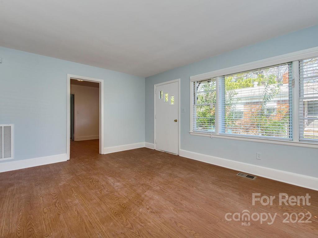 943 B Norland Road, Unit B Charlotte, NC 28205 - Photo 6 of 17 a view of an empty room with a window