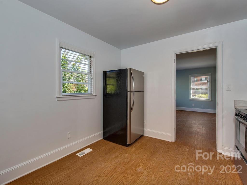 943 B Norland Road, Unit B Charlotte, NC 28205 - Photo 10 of 17 an empty room with windows and closet