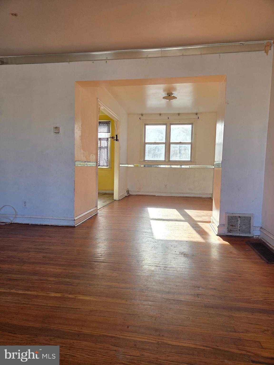 2912 Passmore Street Philadelphia, PA 19149 - Photo 4 of 13 a view of empty room with wooden floor and fan