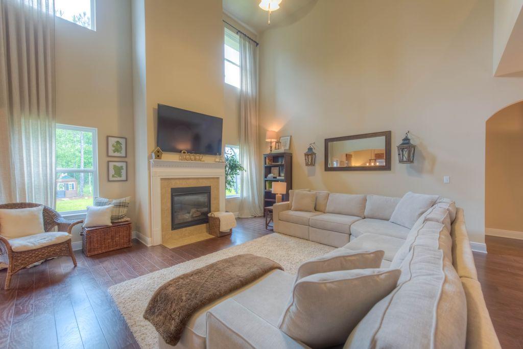 418 Windchime Way Freeport, FL 32439 - Photo 15 of 53 Living room with FP