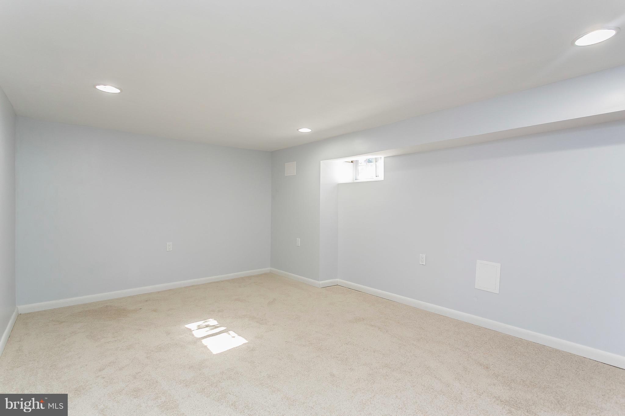 705 Brookwood Road Baltimore, MD 21229 - Photo 25 of 30 Basement has newly finished area.Great family room