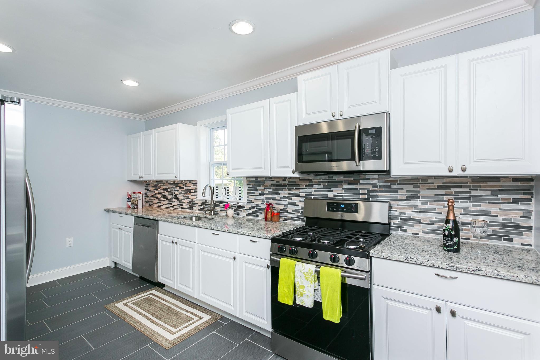 705 Brookwood Road Baltimore, MD 21229 - Photo 4 of 30 Kitchen has been completed updated