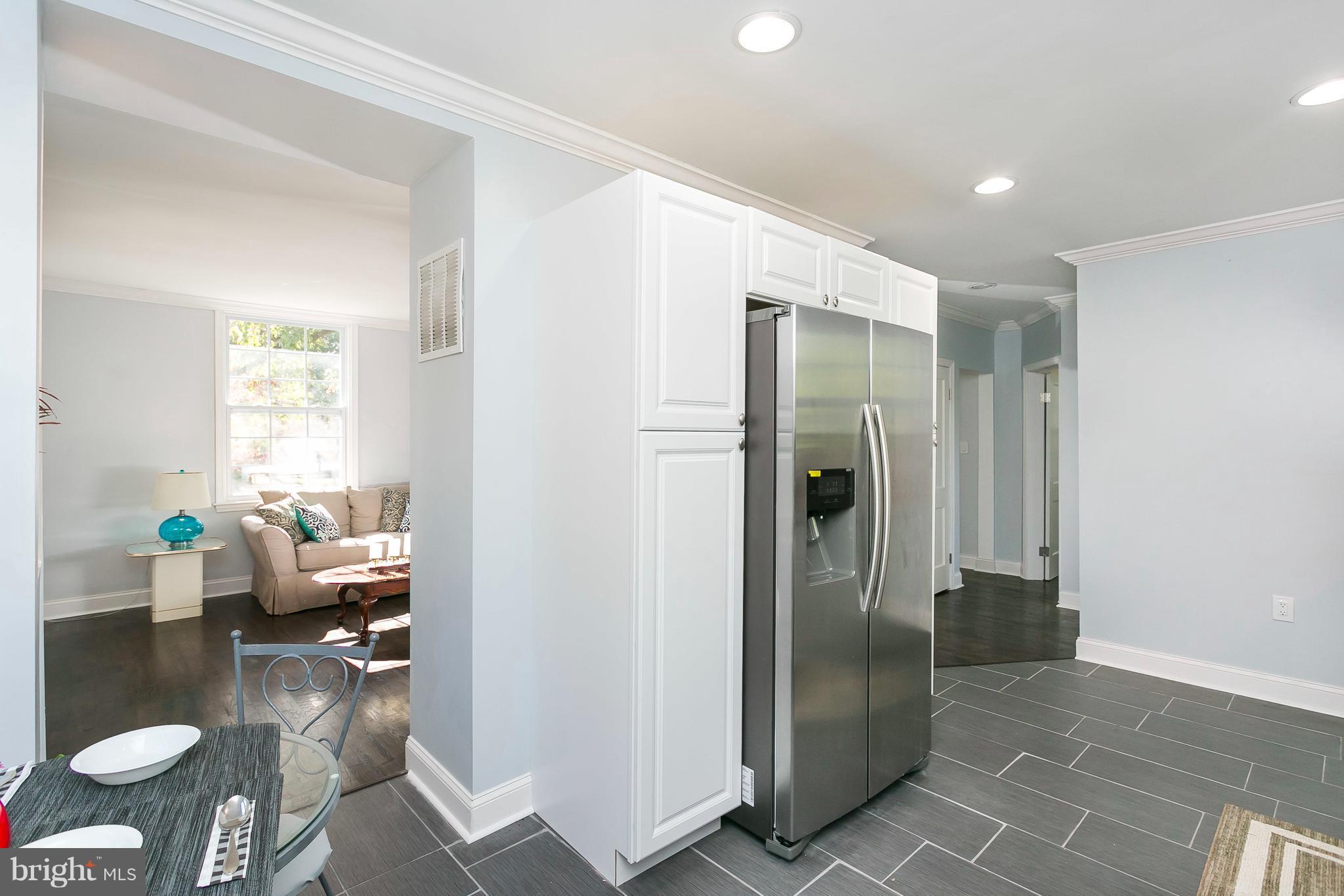 705 Brookwood Road Baltimore, MD 21229 - Photo 6 of 30 Kitchen is open with defined space