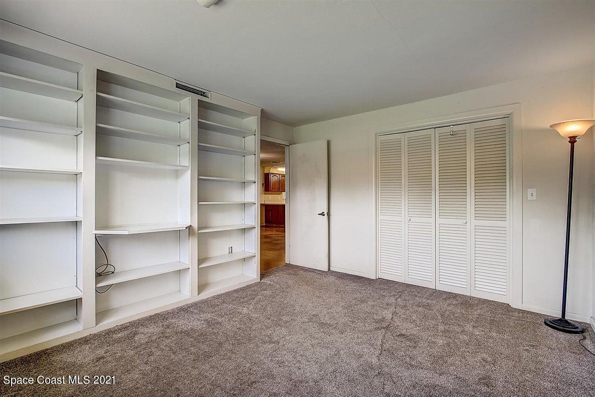 805 Knecht Road Northeast Palm Bay, FL 32905 - Photo 24 of 42 a view of an empty room with a closet