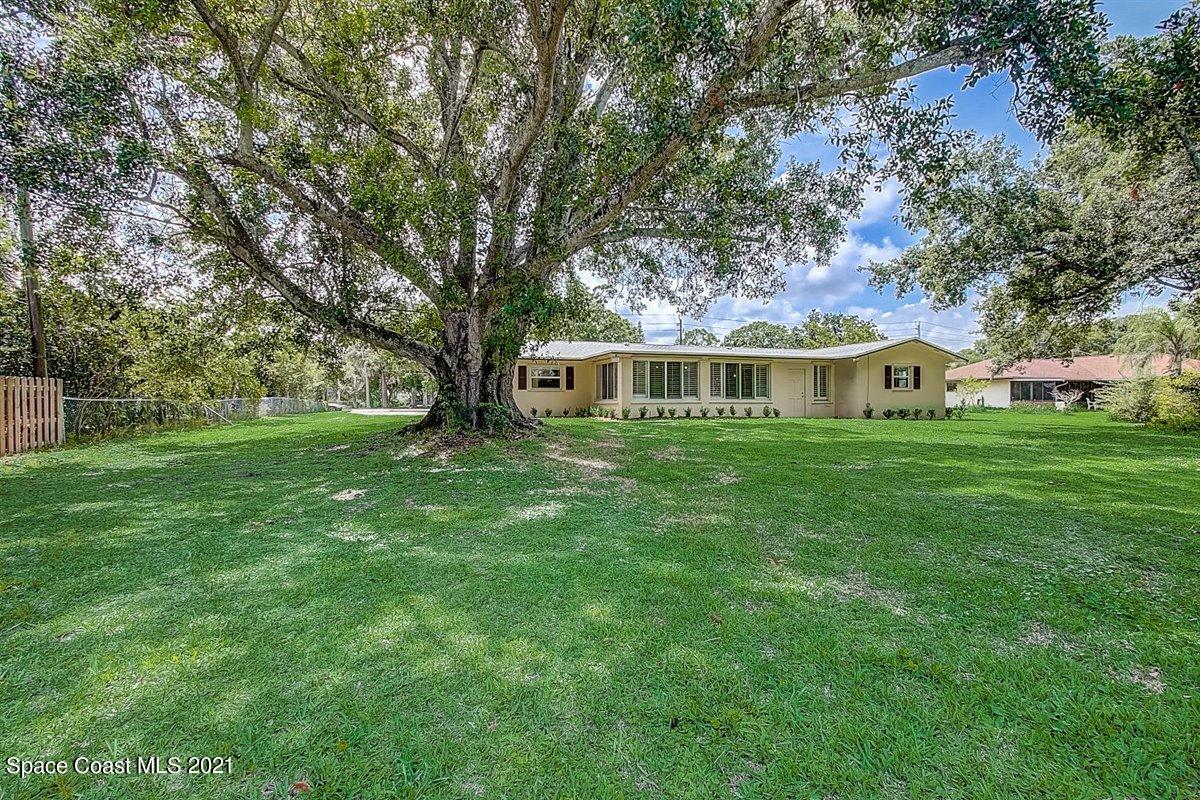 805 Knecht Road Northeast Palm Bay, FL 32905 - Photo 37 of 42 a view of house with yard