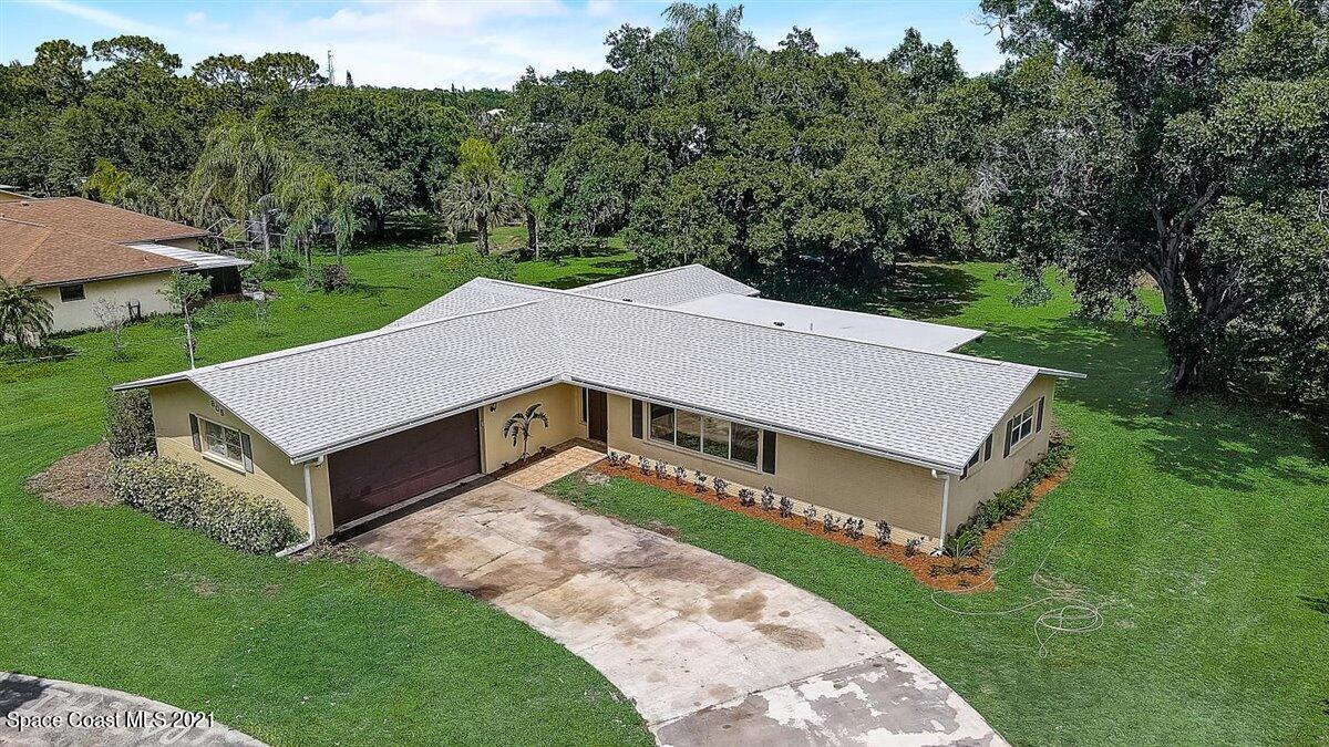 805 Knecht Road Northeast Palm Bay, FL 32905 - Photo 6 of 42 an aerial view of a house