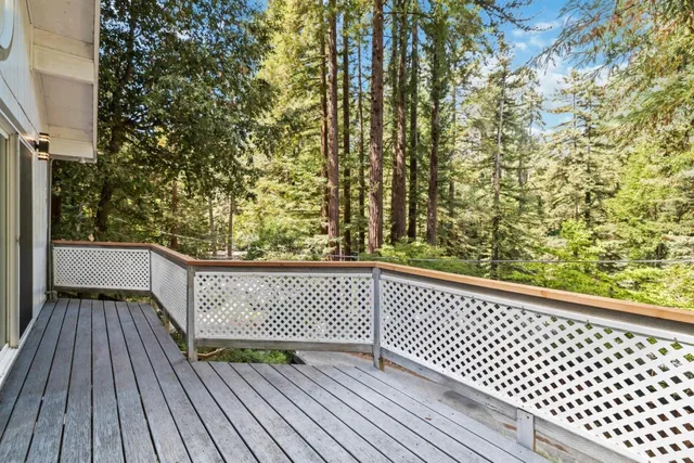 a view of balcony with wooden floor