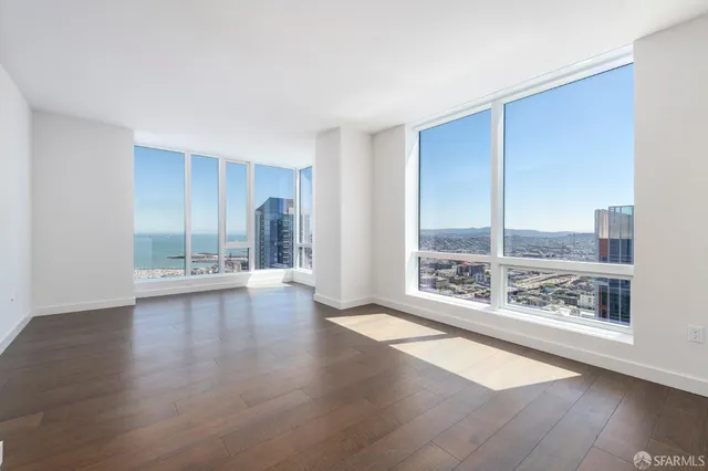 wooden floor in an empty room with window