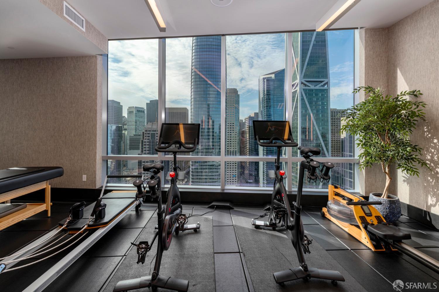 488 Folsom Street, Unit 4305 San Francisco, CA 94105 - Photo 29 of 45 a room with gym equipment and a large window