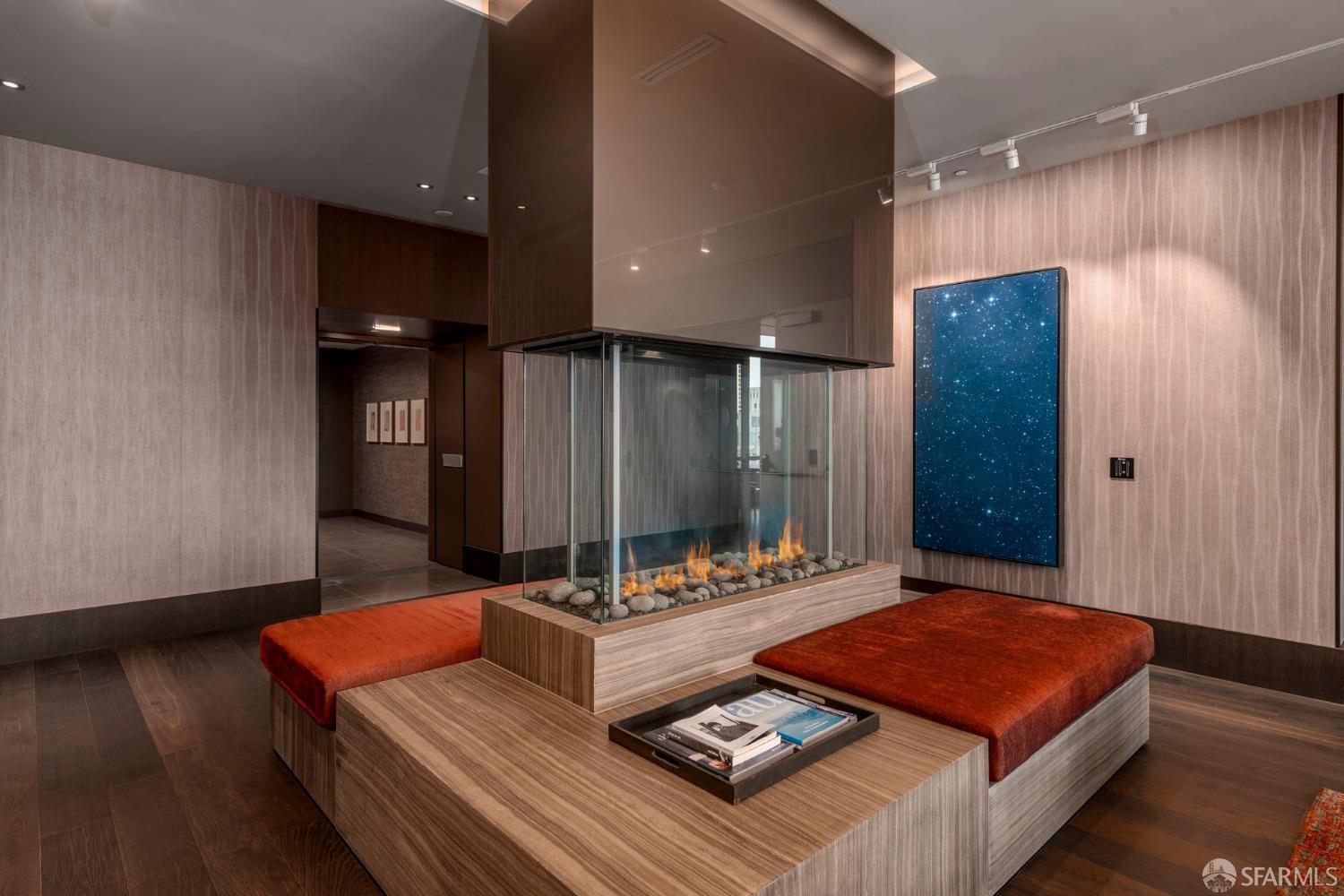 488 Folsom Street, Unit 4305 San Francisco, CA 94105 - Photo 32 of 45 a living room with furniture a rug and kitchen view