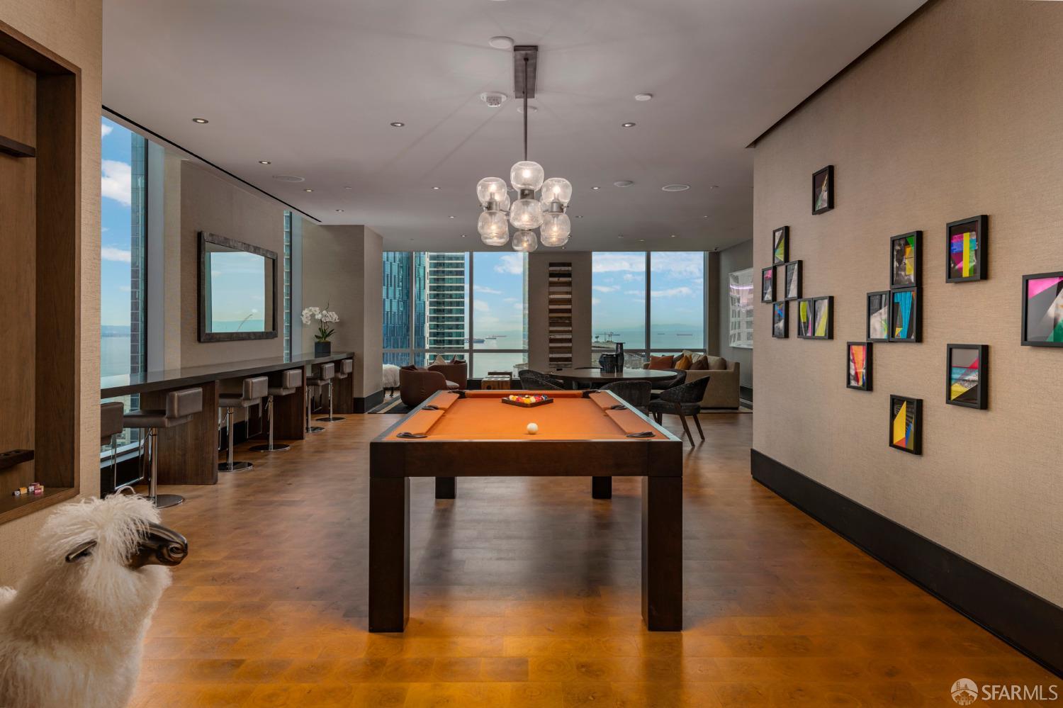 488 Folsom Street, Unit 4305 San Francisco, CA 94105 - Photo 37 of 45 a view of a livingroom with furniture window and wooden floor