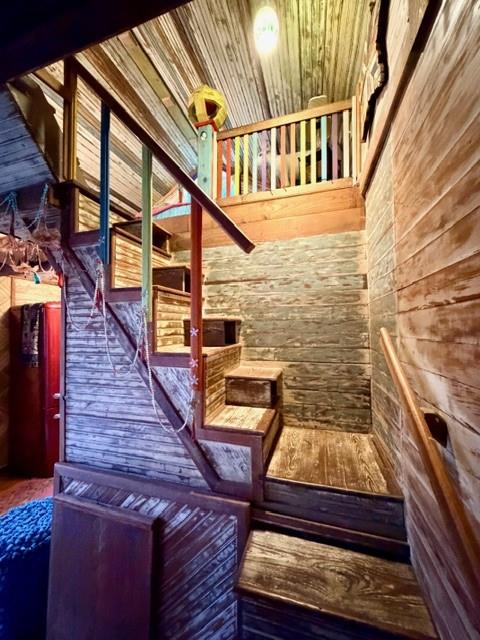 1608 School Street Goldthwaite, TX 76844 - Photo 14 of 25 a view of a balcony with wooden floor and outdoor seating