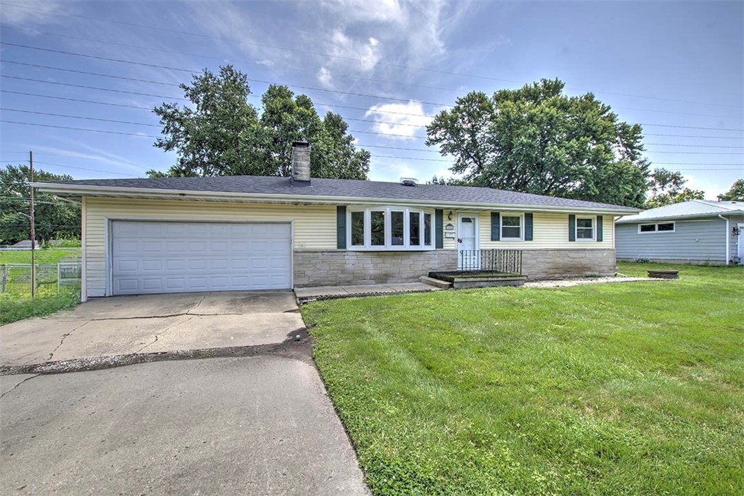 3454 North Christine Drive Decatur, IL 62526 - Photo 21 of 23 a front view of house with yard and green space