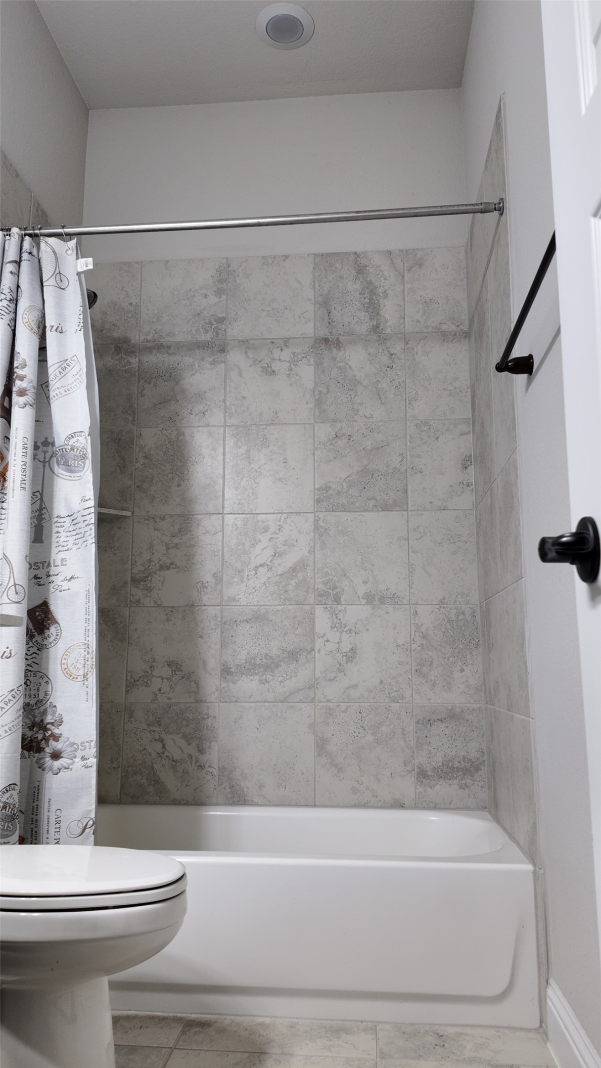 2320 Base Burner Path Leander, TX 78641 - Photo 5 of 24 A well-appointed bathroom features a bathtub and shower combination with stylish tile surround.