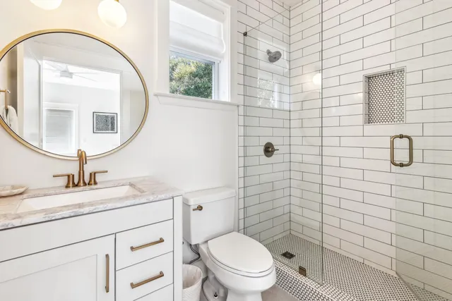 a view of front door with wooden floor and chair
