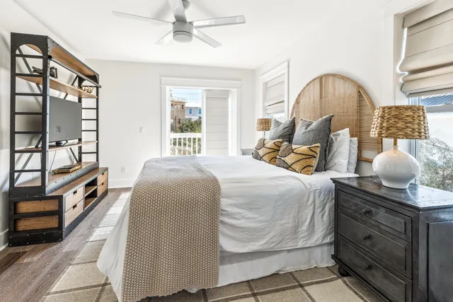 a view of a chair and tables front of the house