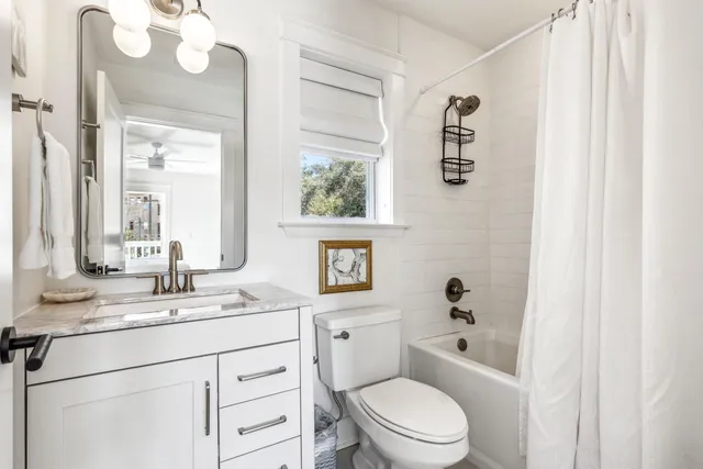 a view of a hallway with windows