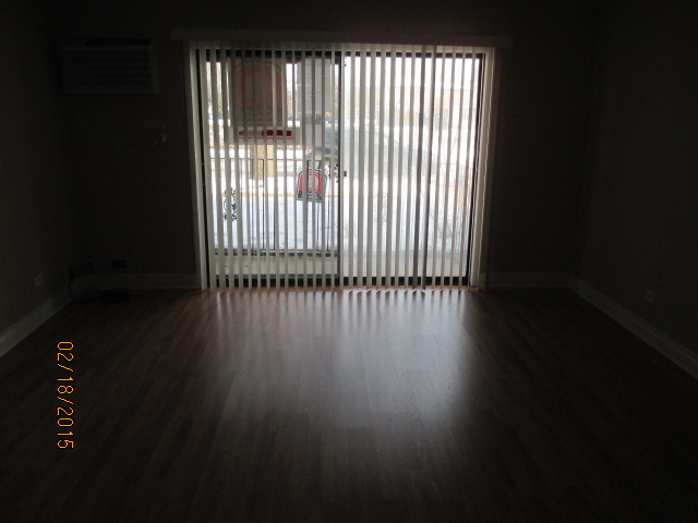 6001 Marshall Avenue, Unit 4 Chicago Ridge, IL 60415 - Photo 2 of 7 a view of outdoor space with wooden floor