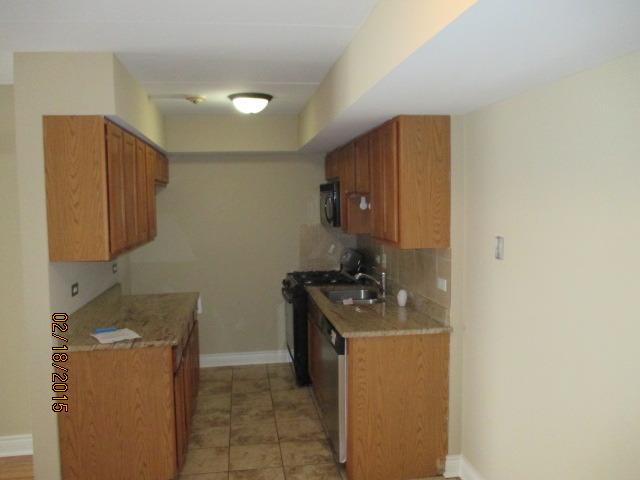 6001 Marshall Avenue, Unit 4 Chicago Ridge, IL 60415 - Photo 6 of 7 a room with storage and utility